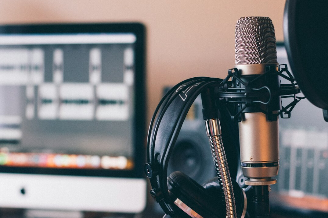 News desk with microphones in a studio
